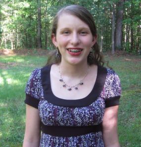 After a shopping trip to Kohl's, I made Emma a necklace and some earrings to go with this outfit she picked out.  