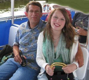 Phill and Emma on our trip to Ct. 2010.  My sister and brother-in-law treated us to a wonderful boat trip and clam back dinner on a little island.  Phill is drinking a little bottle of champagne because it was also our 26th anniversary.  Emma has a great smile in this photo, but she was rude and nasty to my sister and brother-in-law for pretty much our entire visit hiding out in the basement or just being withdrawn and unfriendly.