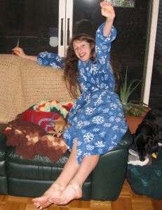 Emma stretching with joy on Christmas morning, 2007.  Emma Roey, Emma Katherine Roey, Emma Kate Roey